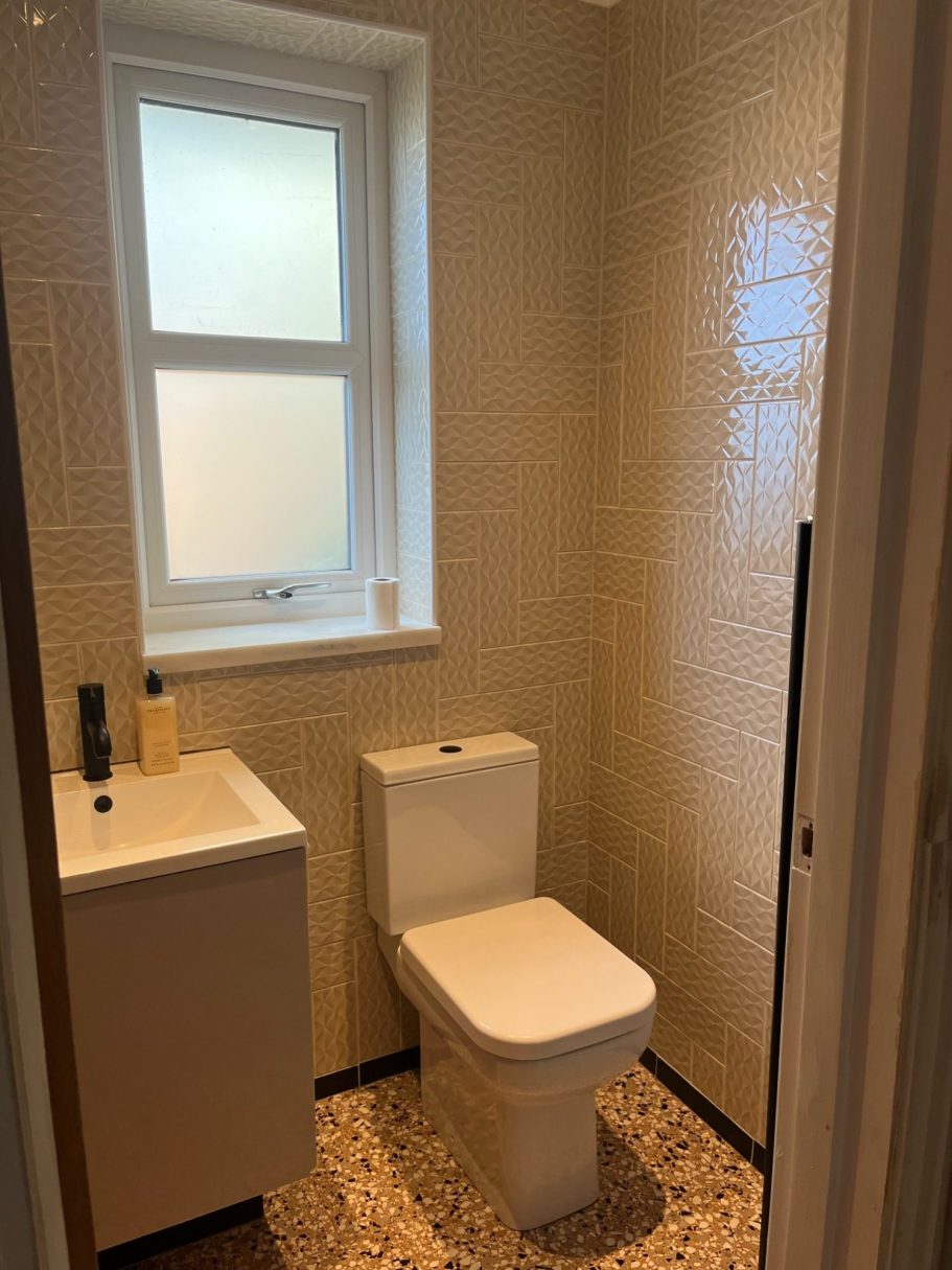 Renovated Herringbone Toilet Tile